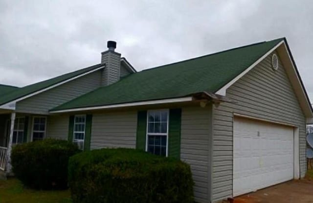 view of side of property with a chimney