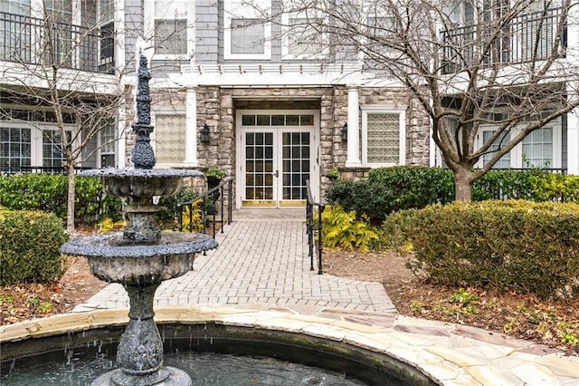 4100 Paces Walk SE Unit 2304, Atlanta, GA 30339 - property entrance featuring french doors and stone siding