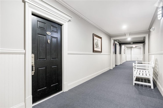 4100 Paces Walk SE Unit 2304, Atlanta, GA 30339 - hallway with carpet, a wainscoted wall, a decorative wall, and crown molding