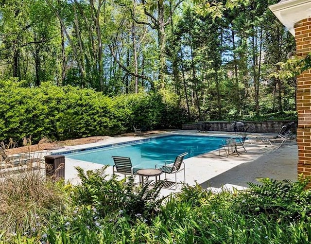 3456 Paces Pl NW, Atlanta, GA 30327 - swimming pool featuring a patio