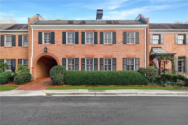 3456 Paces Pl NW, Atlanta, GA 30327 - colonial-style house featuring brick siding and a chimney