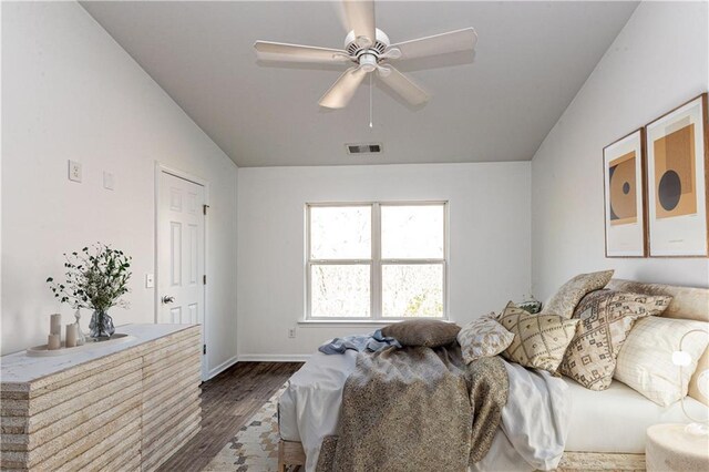 unfurnished bedroom with hardwood / wood-style floors and high vaulted ceiling