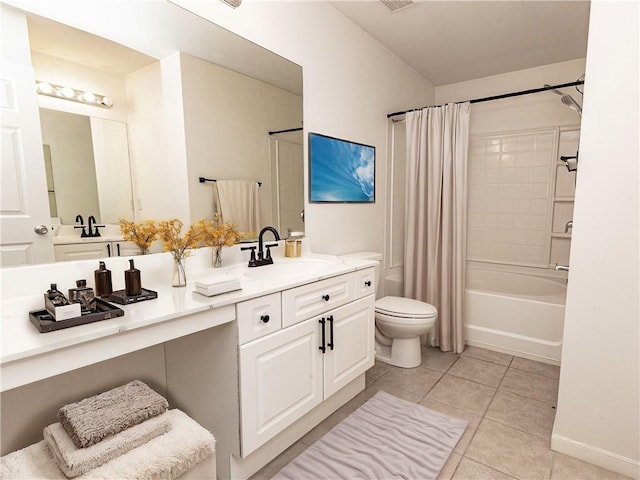 bathroom featuring tile patterned floors and vanity