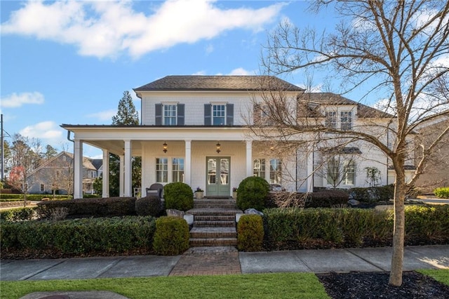 view of front of home featuring french doors and a porch