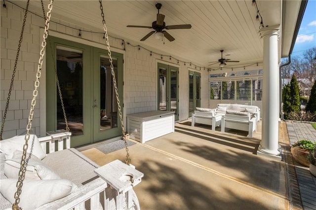 view of patio featuring an outdoor living space, french doors, and a ceiling fan