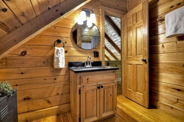 28452 Morganton Hwy, Suches, GA 30572 - bathroom featuring wooden walls, vanity, and wood finished floors