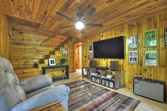 28452 Morganton Hwy, Suches, GA 30572 - living area featuring wooden walls, a ceiling fan, wooden ceiling, wood finished floors, and lofted ceiling