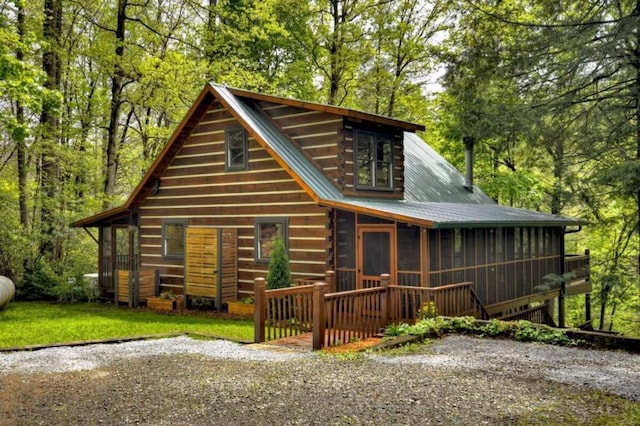 28452 Morganton Hwy, Suches, GA 30572 - view of front of house featuring a sunroom and metal roof