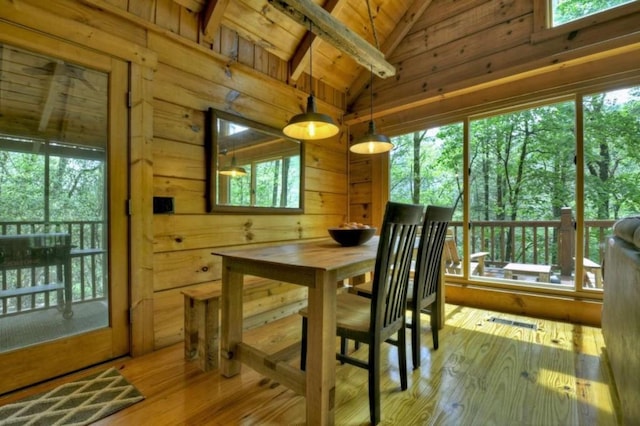 28452 Morganton Hwy, Suches, GA 30572 - dining space featuring hardwood / wood-style flooring, plenty of natural light, wood walls, and wooden ceiling