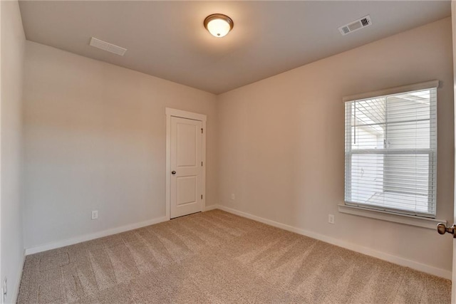 view of carpeted spare room