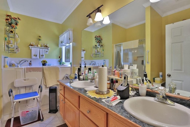 bathroom with vanity, an enclosed shower, ornamental molding, and tile patterned floors