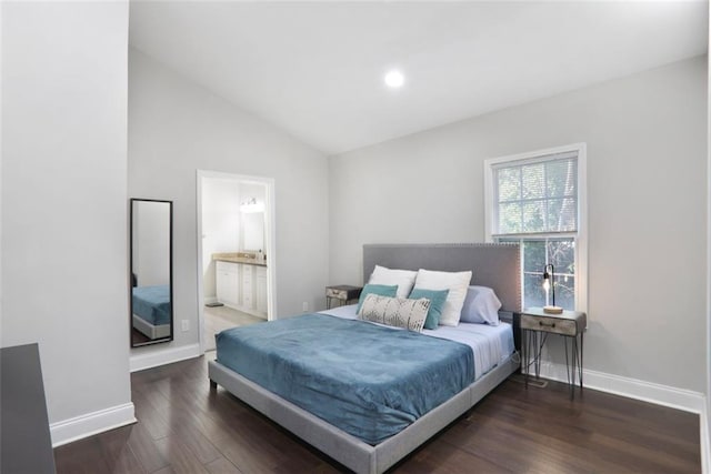 bedroom featuring baseboards, wood finished floors, ensuite bathroom, vaulted ceiling, and recessed lighting