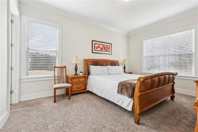 carpeted bedroom with ornamental molding