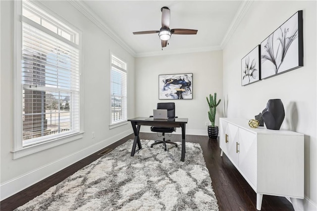 office space featuring crown molding, dark wood-type flooring, and ceiling fan