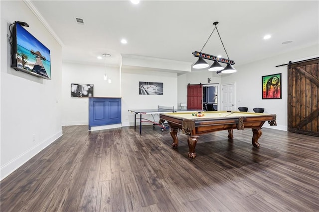 playroom featuring ornamental molding, a barn door, dark hardwood / wood-style flooring, and billiards