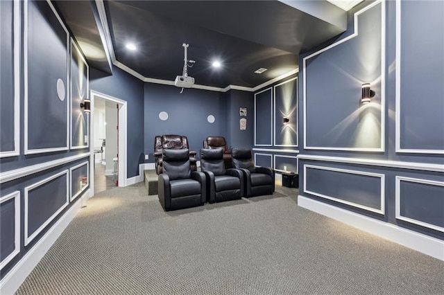 cinema featuring crown molding and carpet floors