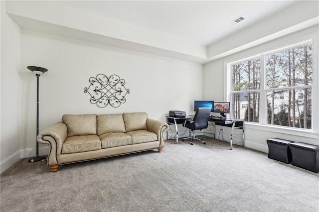 office area with plenty of natural light and carpet flooring