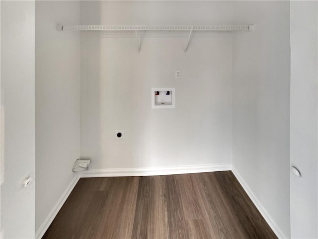 clothes washing area with dark wood-style floors, washer hookup, hookup for an electric dryer, and baseboards