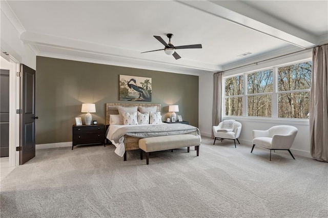 bedroom with baseboards, visible vents, crown molding, and carpet
