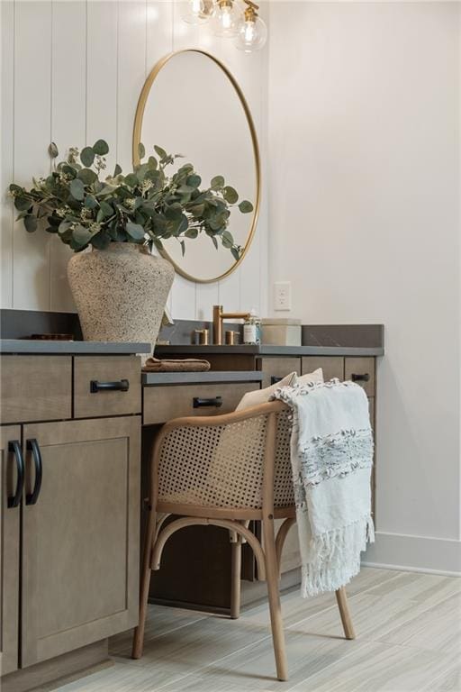 interior details with wood finished floors and baseboards