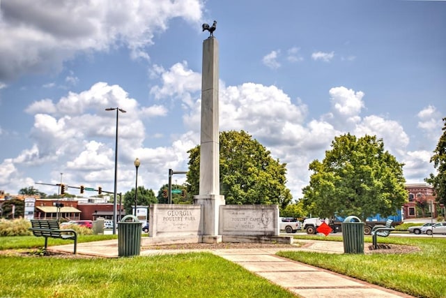 surrounding community with a lawn