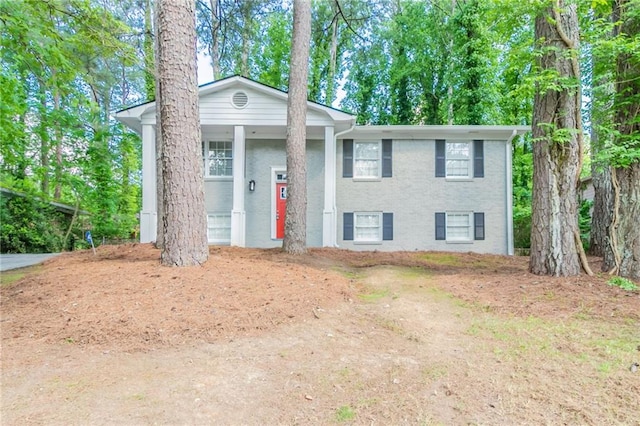 view of front of house with brick siding