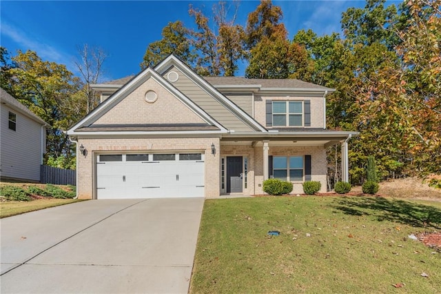392 Dublin Way, Dallas, GA 30132 - view of front of property featuring a front yard, concrete driveway, an attached garage, and brick siding