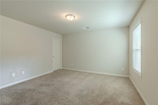 392 Dublin Way, Dallas, GA 30132 - spare room featuring a wealth of natural light, baseboards, and carpet floors