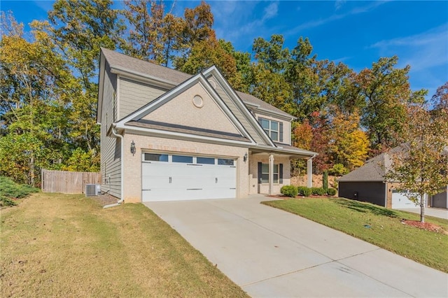 392 Dublin Way, Dallas, GA 30132 - traditional-style home featuring brick siding, fence, a front lawn, concrete driveway, and an attached garage