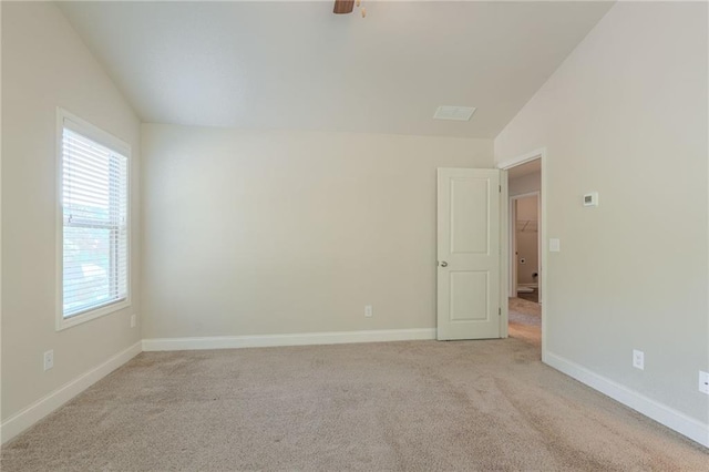 392 Dublin Way, Dallas, GA 30132 - spare room featuring carpet flooring, vaulted ceiling, and a wealth of natural light