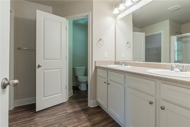392 Dublin Way, Dallas, GA 30132 - bathroom with a shower stall, toilet, double vanity, and a sink