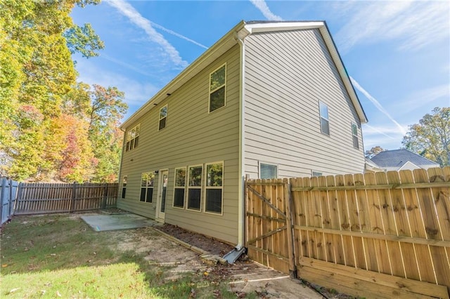 392 Dublin Way, Dallas, GA 30132 - rear view of house with a patio and a fenced backyard