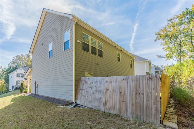 392 Dublin Way, Dallas, GA 30132 - view of home's exterior with a lawn and fence