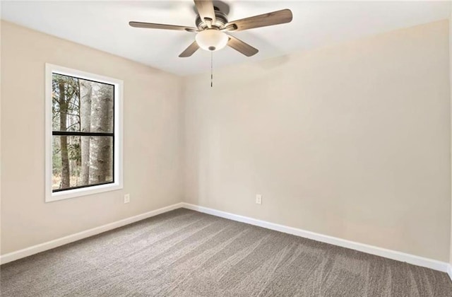 67 Gatewood Rd, Ellijay, GA 30540 - carpeted spare room with baseboards and ceiling fan