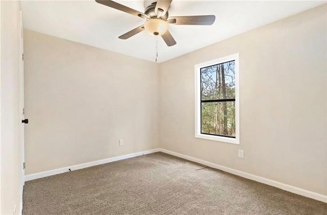 67 Gatewood Rd, Ellijay, GA 30540 - carpeted spare room with baseboards and a ceiling fan