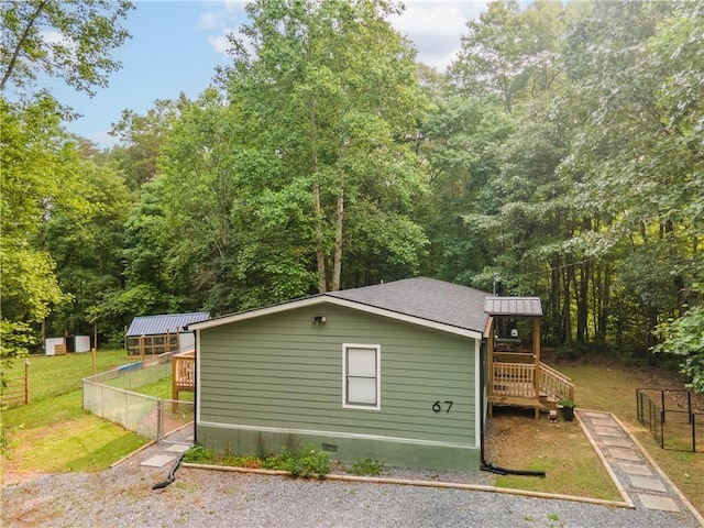 67 Gatewood Rd, Ellijay, GA 30540 - view of side of property featuring crawl space, roof with shingles, and an outbuilding