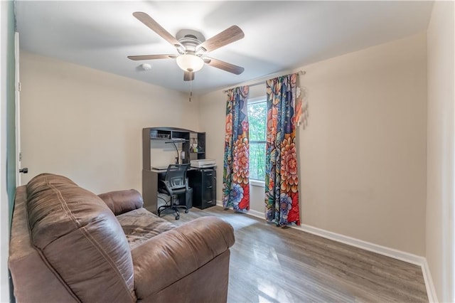 67 Gatewood Rd, Ellijay, GA 30540 - living area with baseboards, wood finished floors, and a ceiling fan