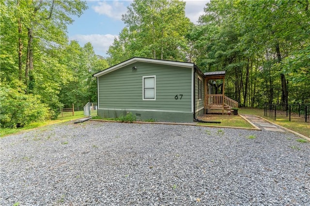 67 Gatewood Rd, Ellijay, GA 30540 - view of home's exterior with crawl space and driveway