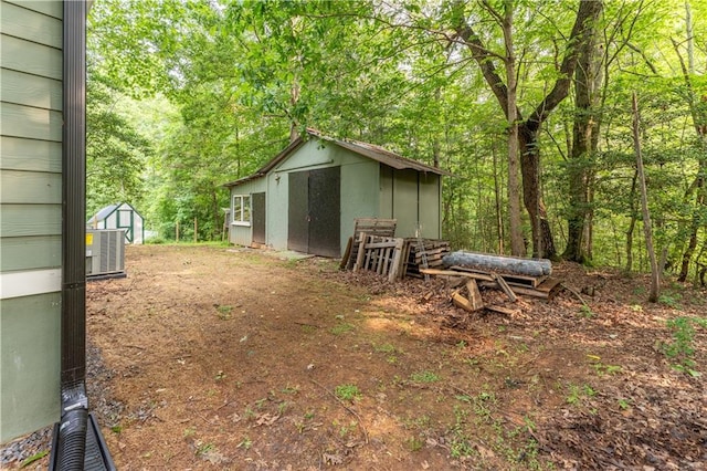 67 Gatewood Rd, Ellijay, GA 30540 - view of yard with central AC and a forest view