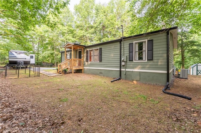 67 Gatewood Rd, Ellijay, GA 30540 - view of front of property with central AC, crawl space, and view of wooded area