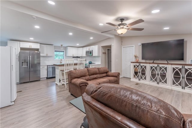 67 Gatewood Rd, Ellijay, GA 30540 - living area featuring light wood finished floors, ceiling fan, vaulted ceiling, and recessed lighting