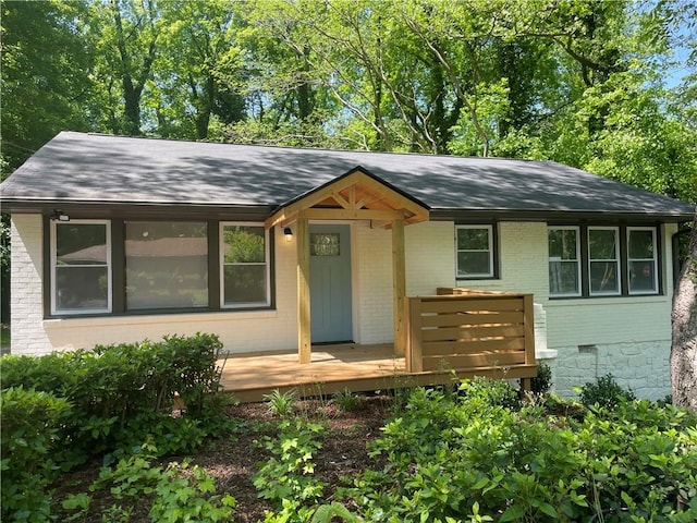 view of front of home with a deck