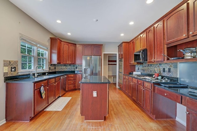 1663 Willow Way, Woodstock, GA 30188 - kitchen featuring stainless steel appliances, a sink, a center island, backsplash, and recessed lighting