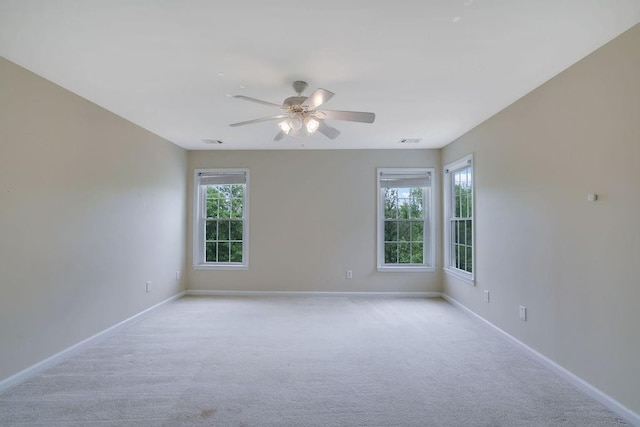 1663 Willow Way, Woodstock, GA 30188 - empty room featuring baseboards, light colored carpet, and a ceiling fan