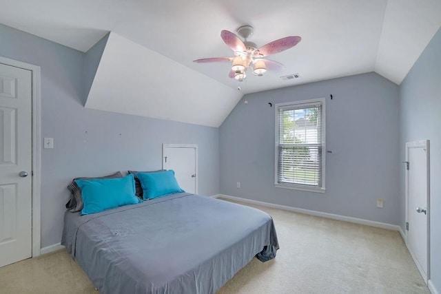 1663 Willow Way, Woodstock, GA 30188 - bedroom with vaulted ceiling, light colored carpet, baseboards, and ceiling fan
