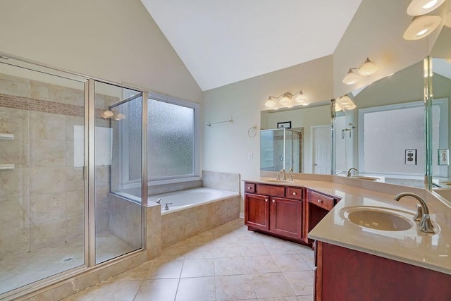 1663 Willow Way, Woodstock, GA 30188 - bathroom with a garden tub, lofted ceiling, a shower stall, tile patterned floors, and vanity