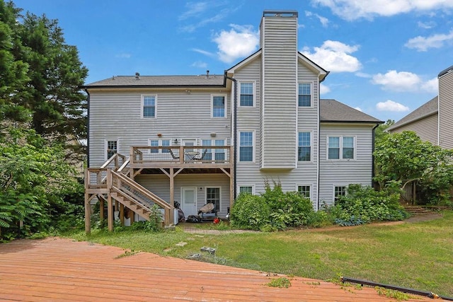 1663 Willow Way, Woodstock, GA 30188 - rear view of property featuring a deck, stairs, a chimney, and a lawn