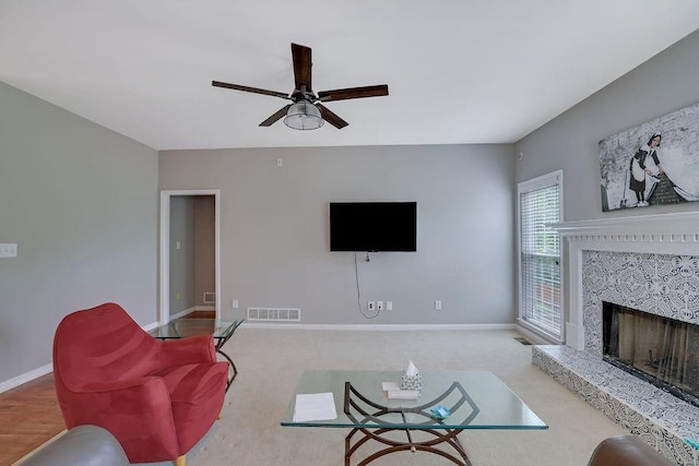 1663 Willow Way, Woodstock, GA 30188 - living area with ceiling fan, a fireplace, baseboards, and carpet