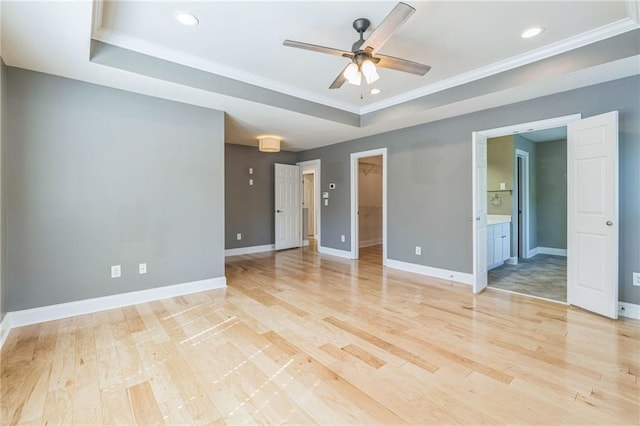 spare room featuring light wood finished floors, baseboards, recessed lighting, and ceiling fan