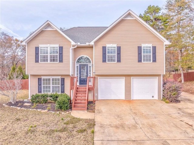 split foyer home featuring a garage